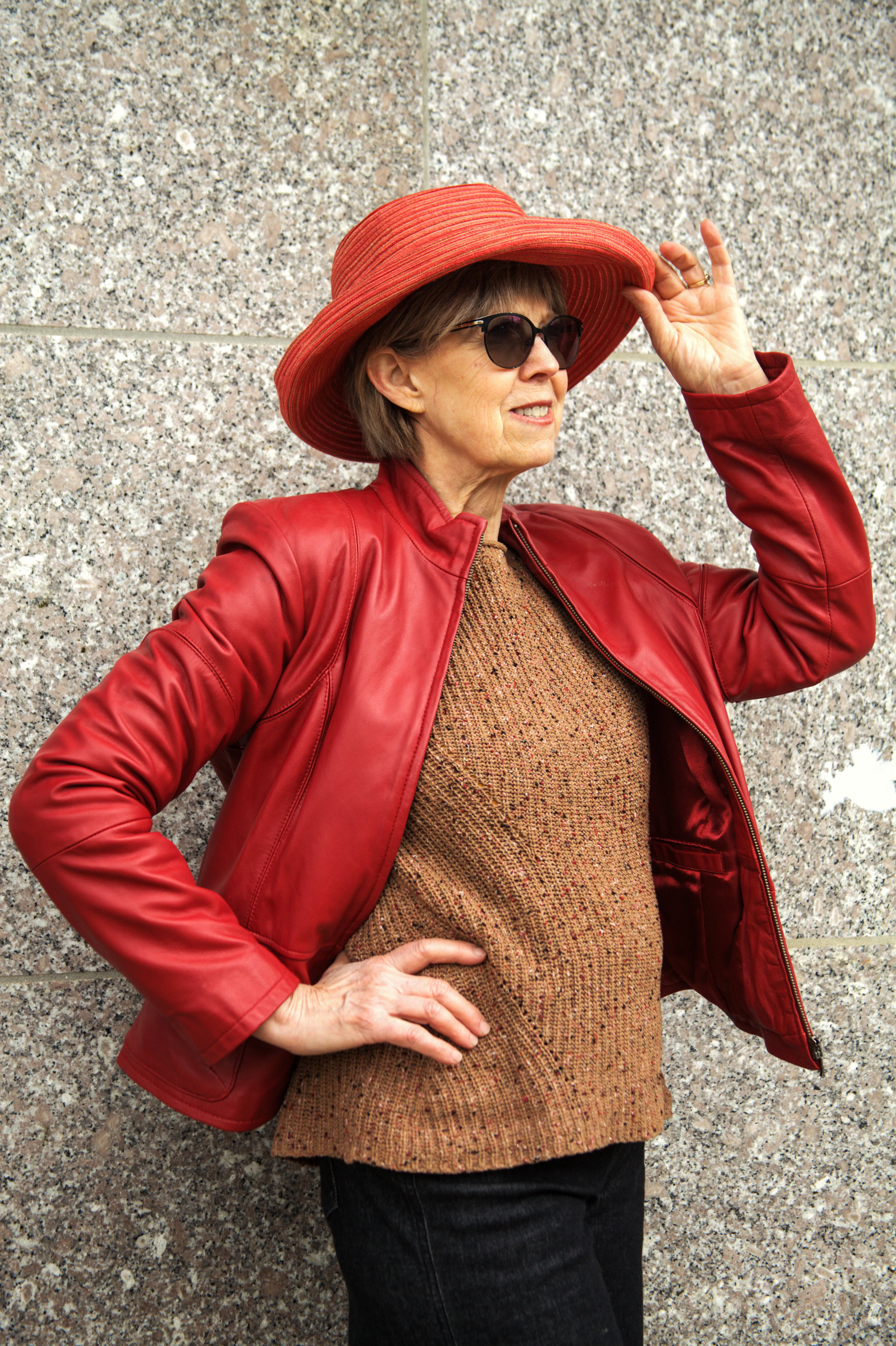 Outdoor portrait of a woman in a red coat