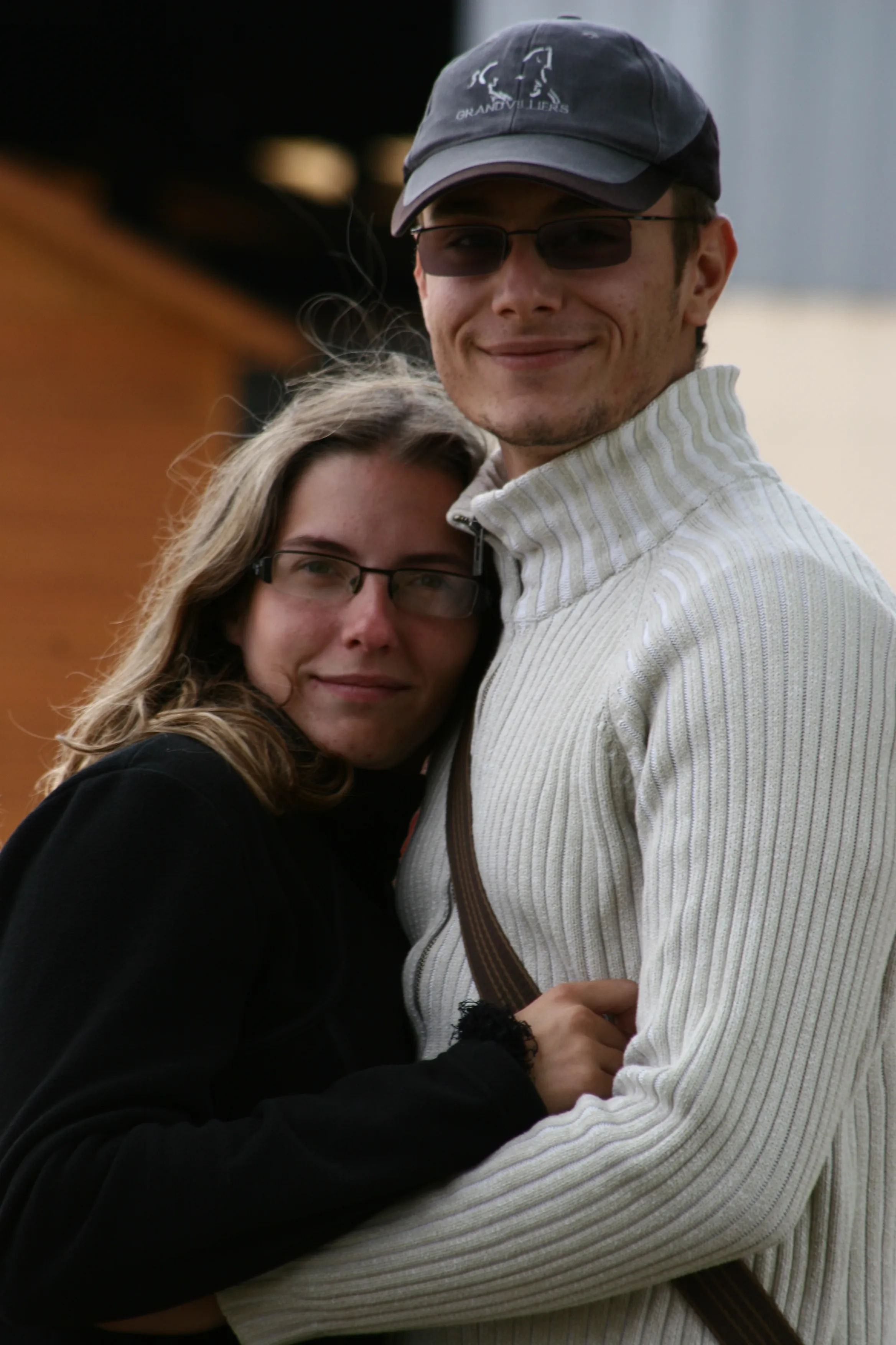 Couple embracing during an outdoor portrait session